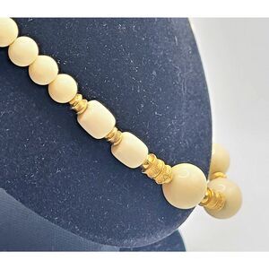 Vintage 80s Ivory and Goldtone Acrylic Graduated Beaded Necklace 20in
